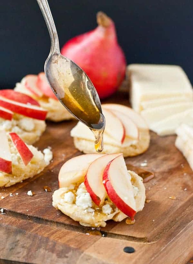 Top Whole Grain Crackers With Sliced Pears and Cheese