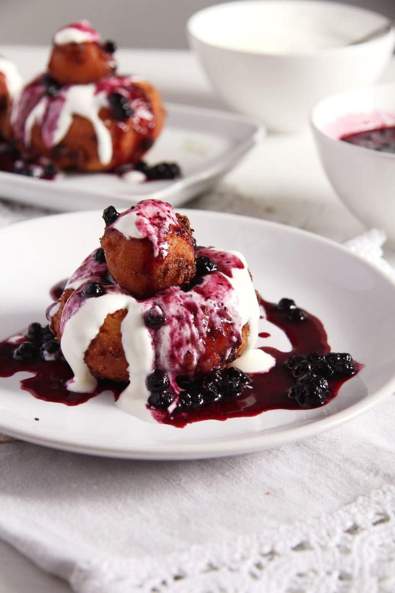 Romanian Papanasi (Fried Cheese Doughnuts)