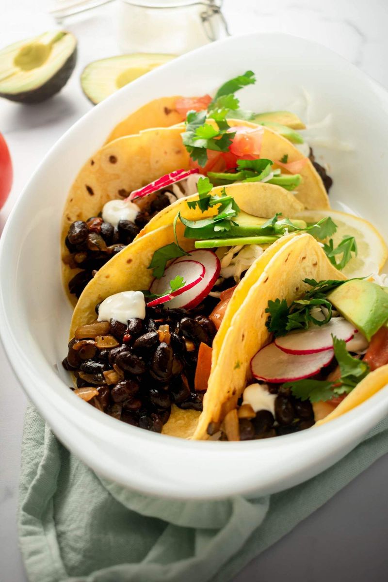 Black Bean Tacos With Mango Salsa And Lime Crema