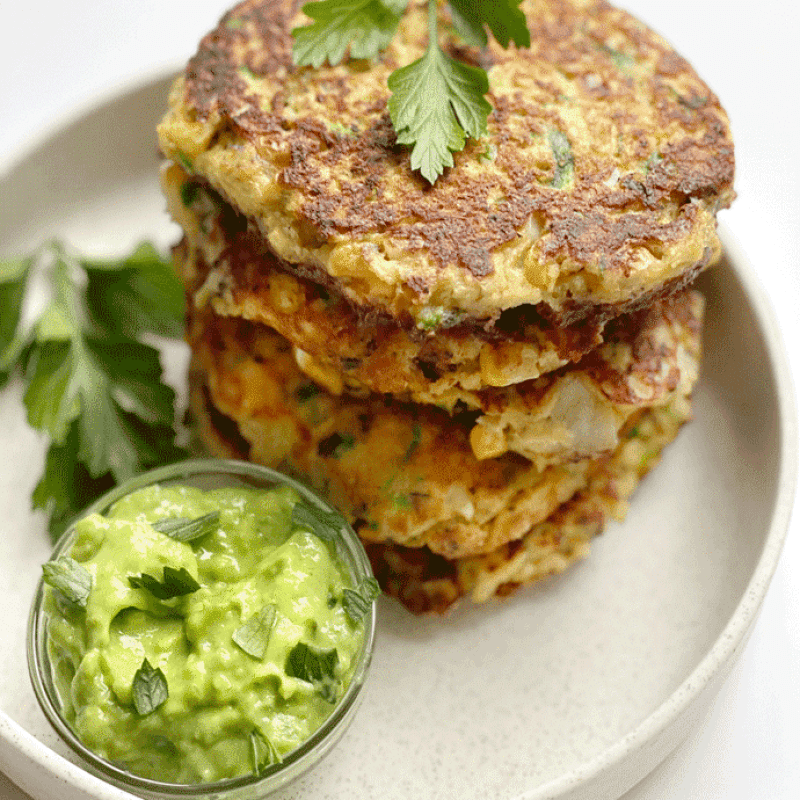Zucchini and Corn Fritters with Avocado Crema