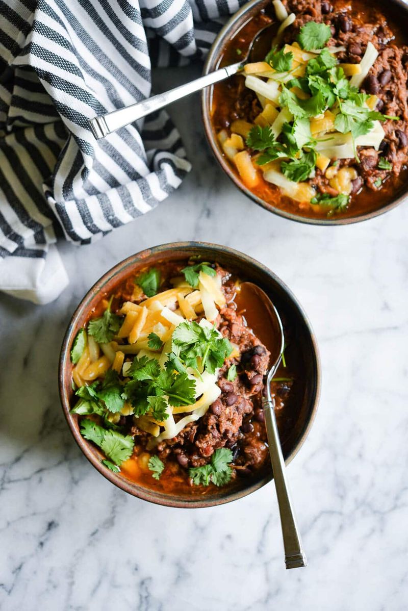 Grate Aged Cheddar Over a Slow-Cooker Chilli