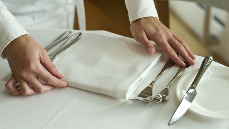 Folding the Napkin Neatly Back on the Table When Leaving