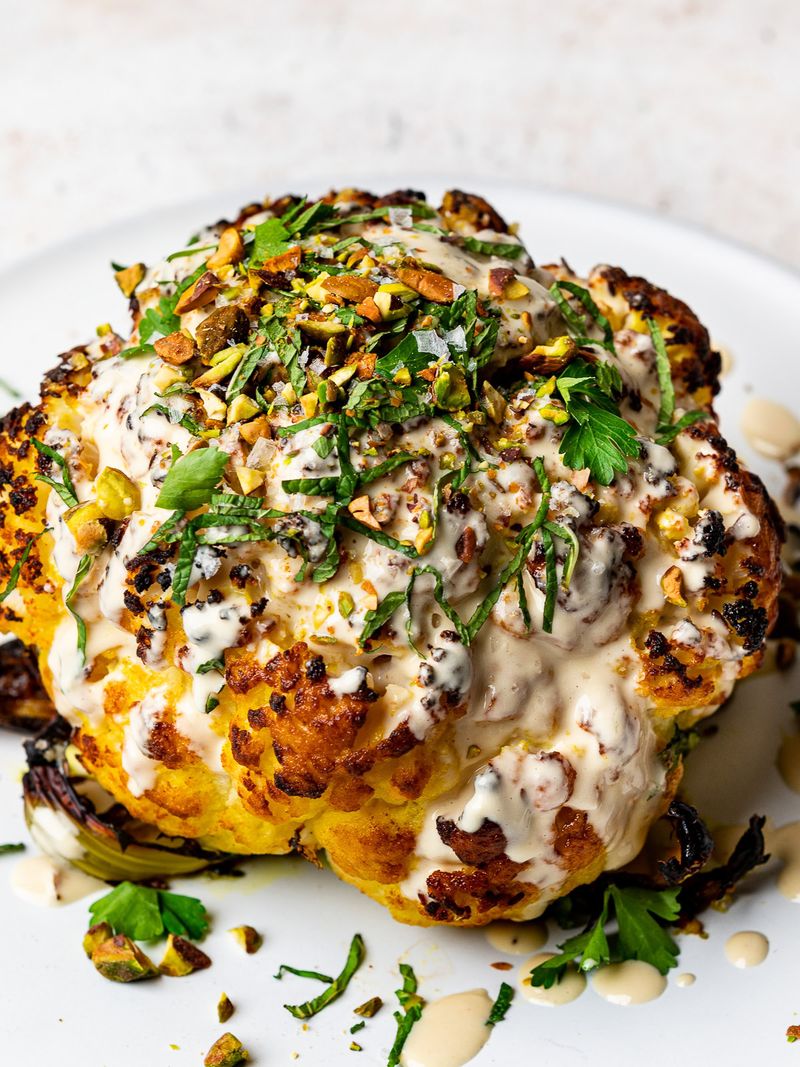 Whole Roasted Cauliflower With Tahini and Herbs