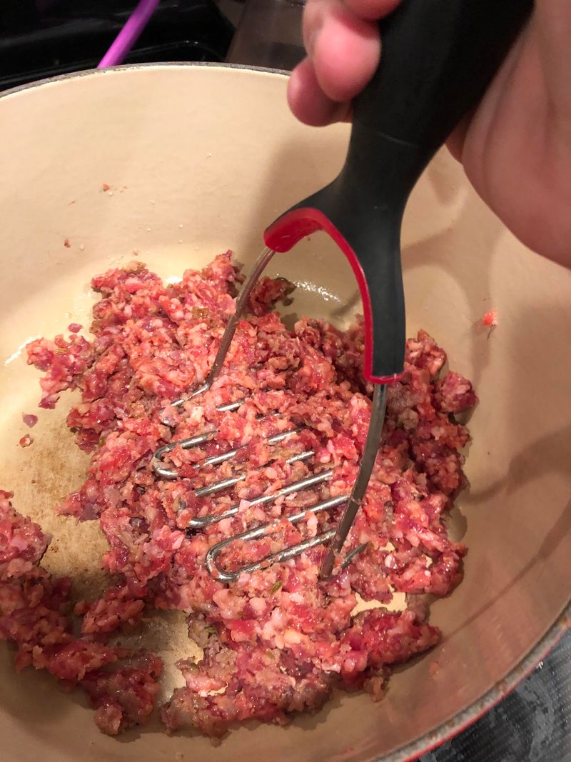 Use a Potato Masher to Brown Ground Meat Faster