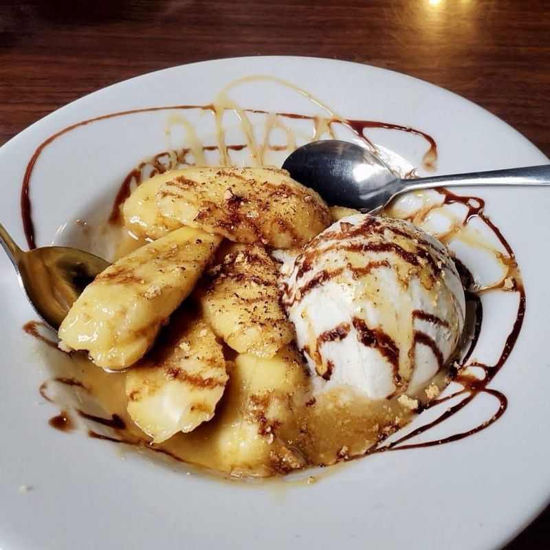 Flambeed Bananas Foster Over Vanilla Ice Cream