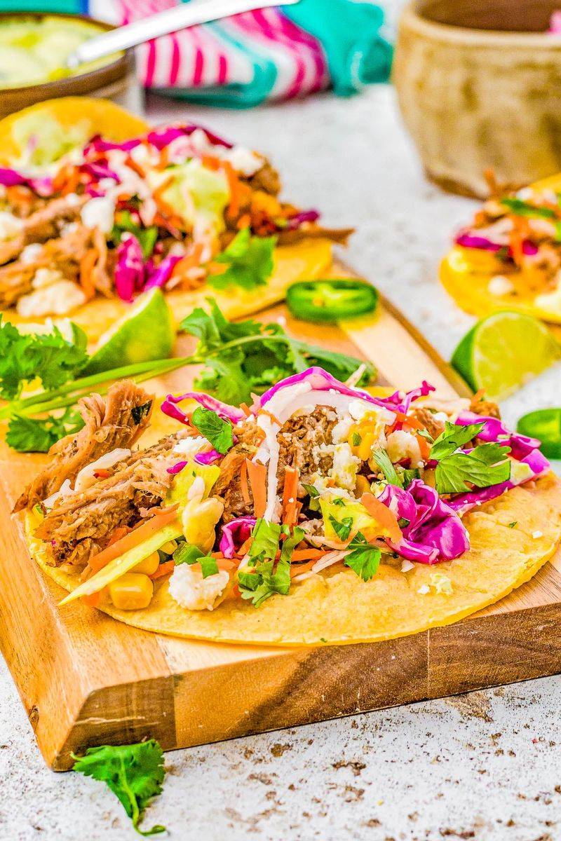 Tumbling Soft Tacos on a Wooden Board