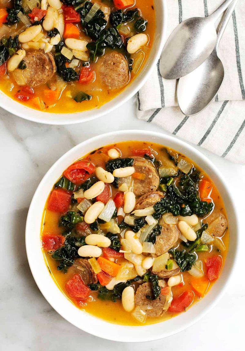 Spicy Sausage And White Bean Soup With Crusty Bread For Dipping
