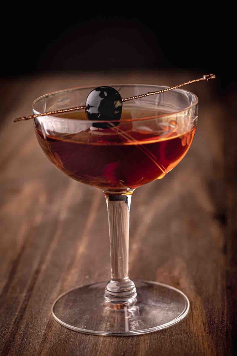 Ordering a Cocktail Called Something Classic Like a Manhattan or Rob Roy