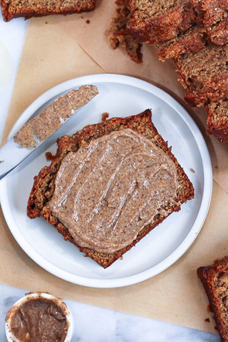 Almond Butter on Whole Wheat Toast With a Glass of Milk