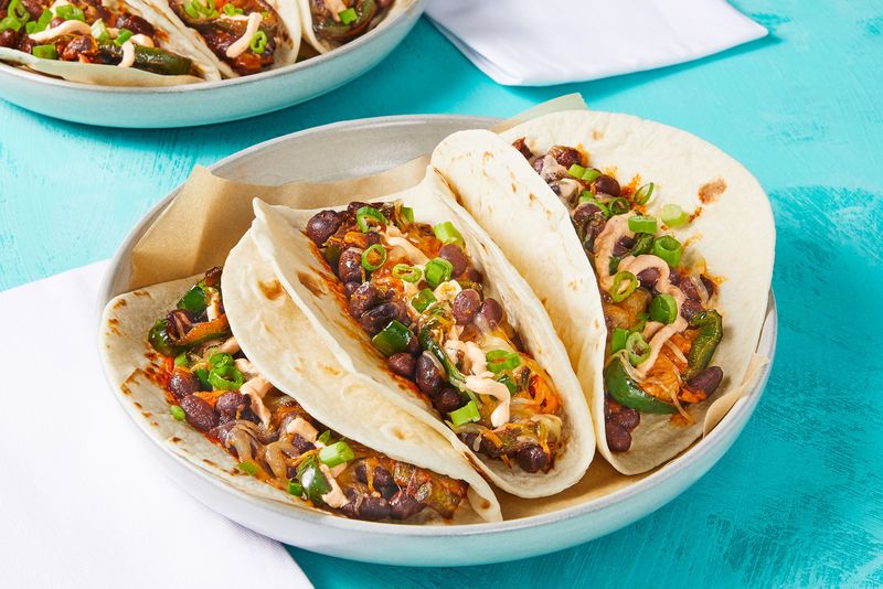 Bean and Cheese Tacos with Pickled Onions