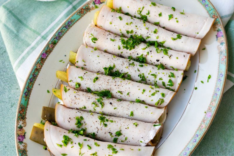 Sliced Deli Turkey Rolled Around a Pickle Spear