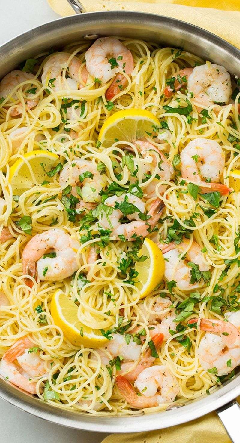 Lemon Garlic Shrimp Stir-Fried With Zucchini And Served Over Angel Hair Pasta
