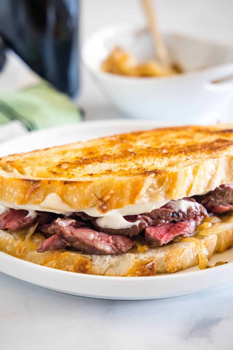 Leftover Steak with Caramelized Onions and Swiss Cheese