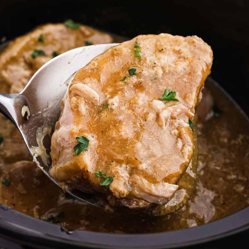 Slow Cooker Pork Chops Bathed in Herb Gravy