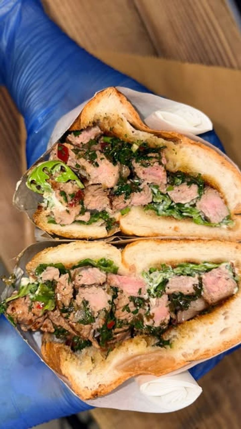 Roast Lamb with Tzatziki, Roasted Peppers, and Rocket