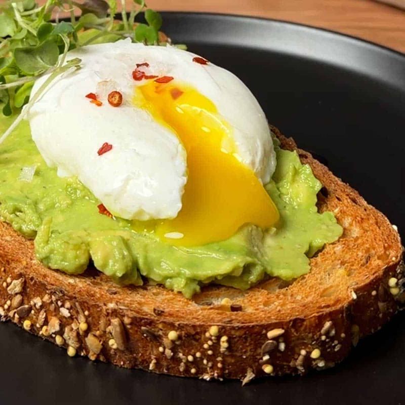 Avocado Toast with Poached Eggs and Microgreens
