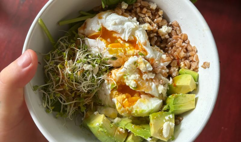 Breakfast Grain Bowl with Farro, Roasted Veggies, and Poached Egg