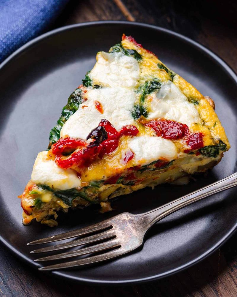 Loaded Veggie Frittata with Spinach, Sun-Dried Tomatoes, and Goat Cheese
