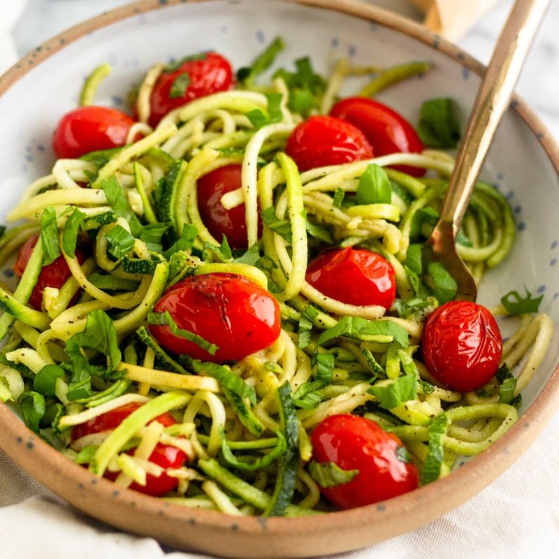 Zucchini Noodles With Pesto and Cherry Tomatoes