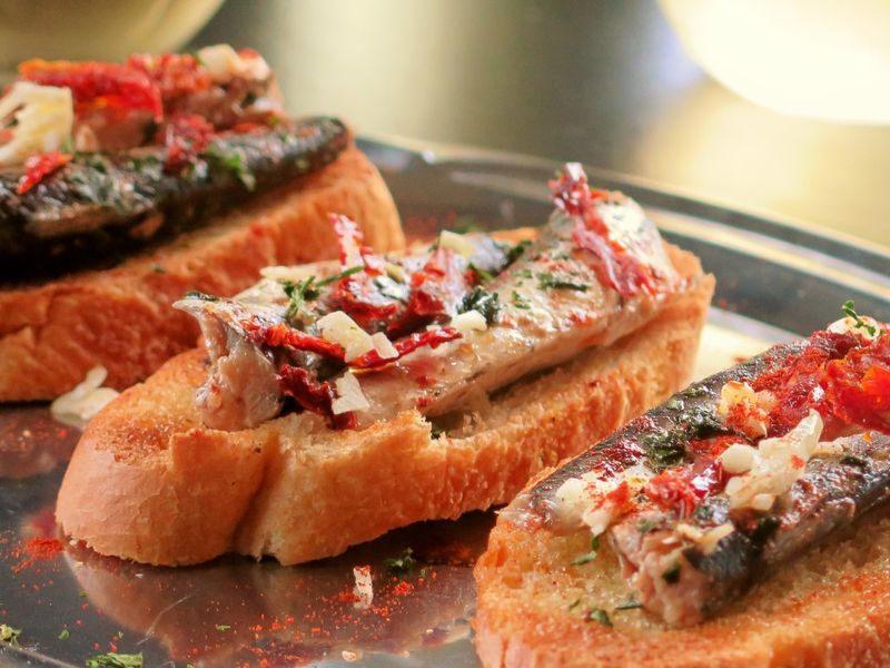 Spanish Sardines with Roasted Peppers on Baguette