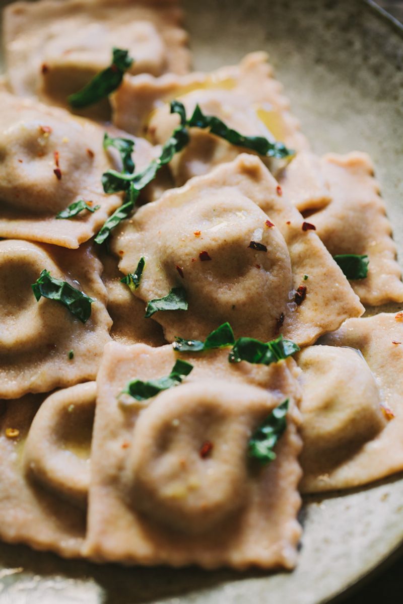 Roasted Garlic and White Bean Ravioli with Kale Pesto