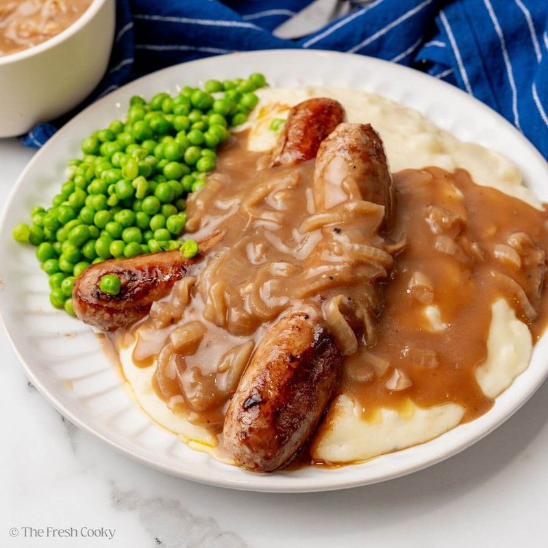 Cheesy Mash with Bratwurst and Mustard Sauce