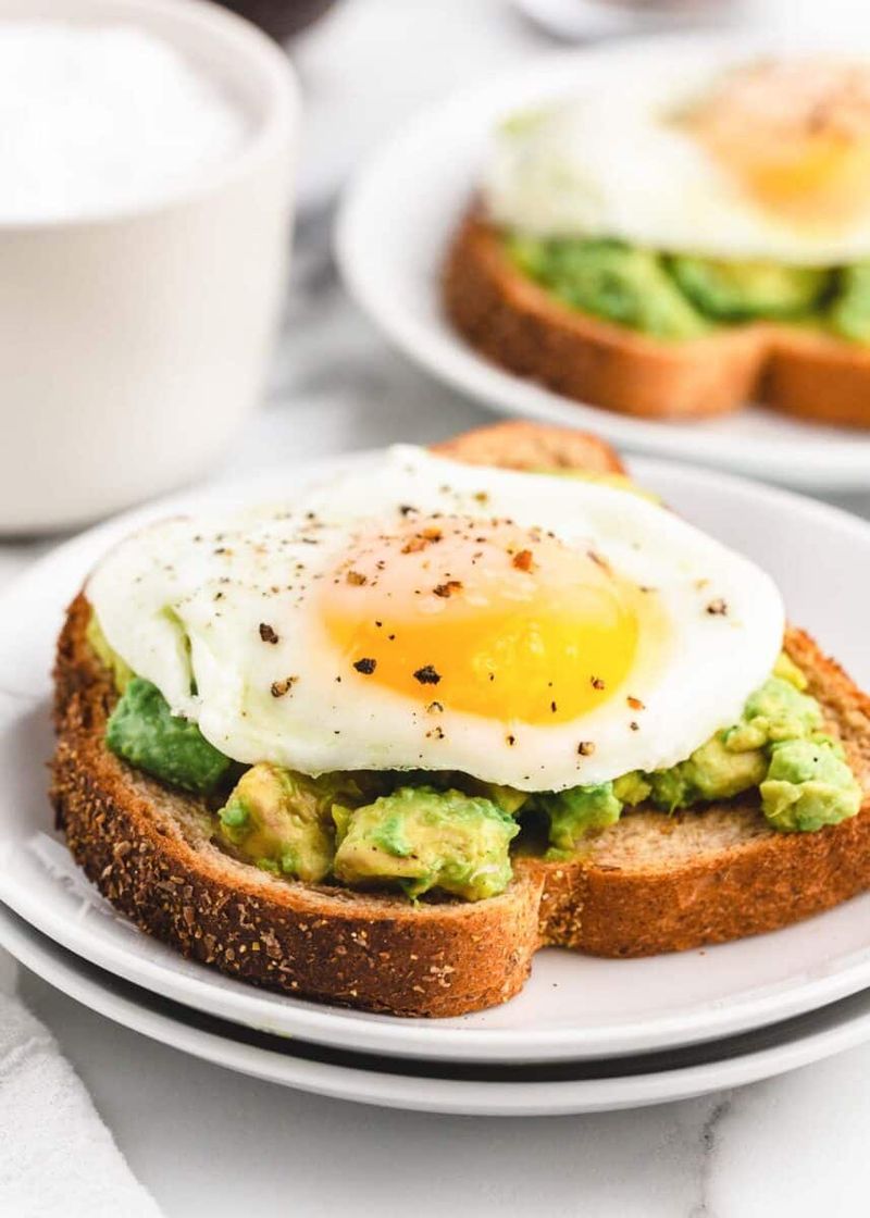 Avocado and Egg Toast on Whole Grain Bread