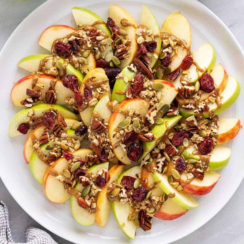 Apple Slices with Peanut Butter and Granola