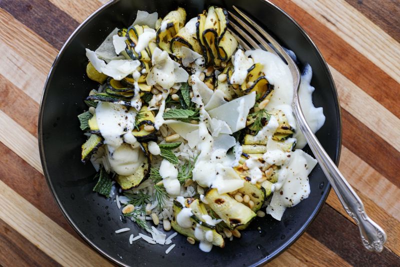 Grilled Zucchini, Lemon, and Pine Nut Bowl