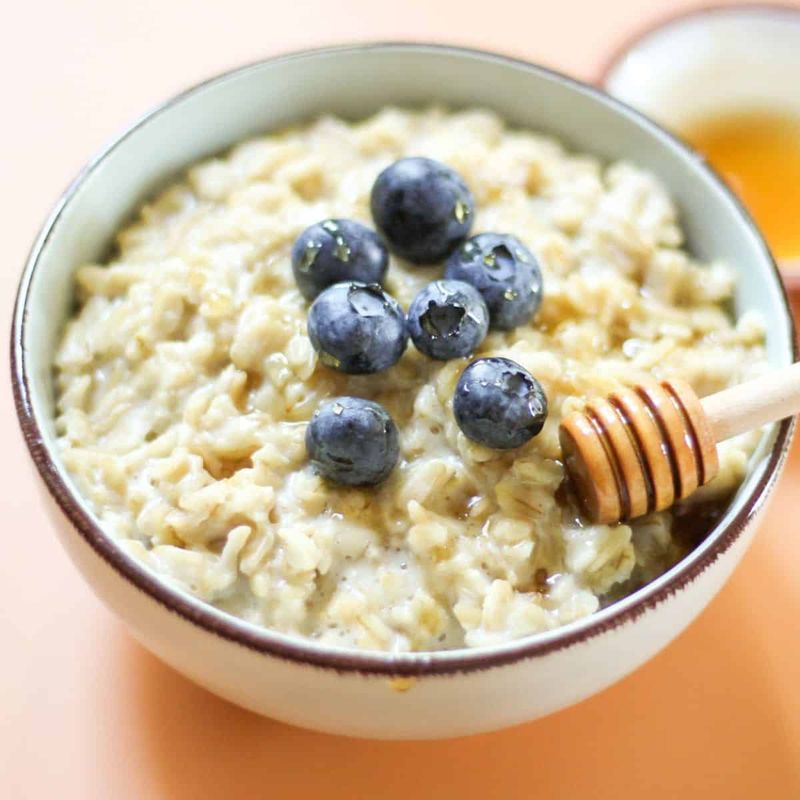 A Small Bowl of Warm Oatmeal with Honey