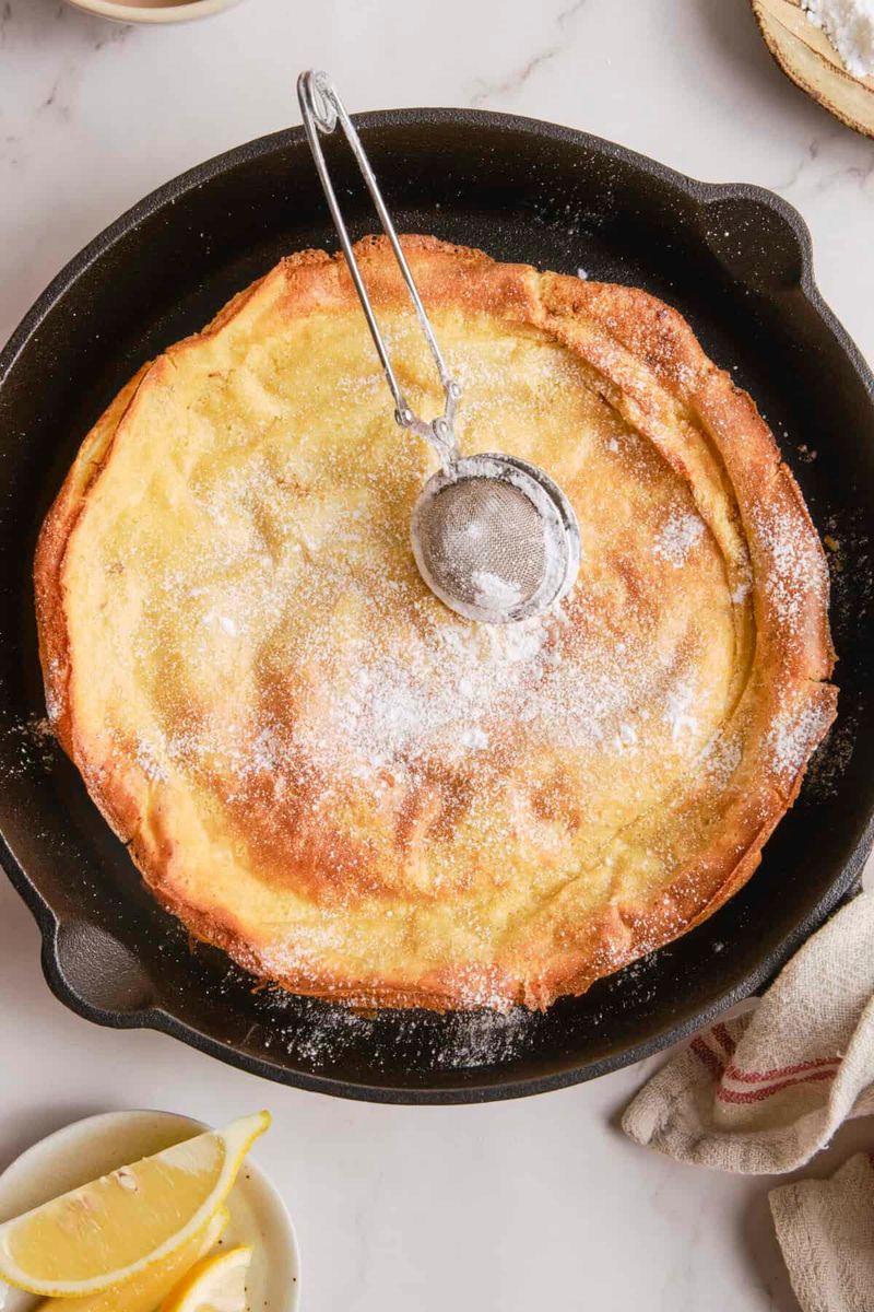 Dutch Baby Pancake with Lemon and Powdered Sugar