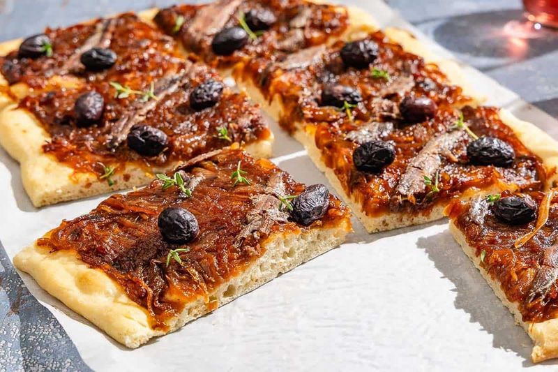 Sardine Flatbread Pizza with Caramelized Onions and Goat Cheese