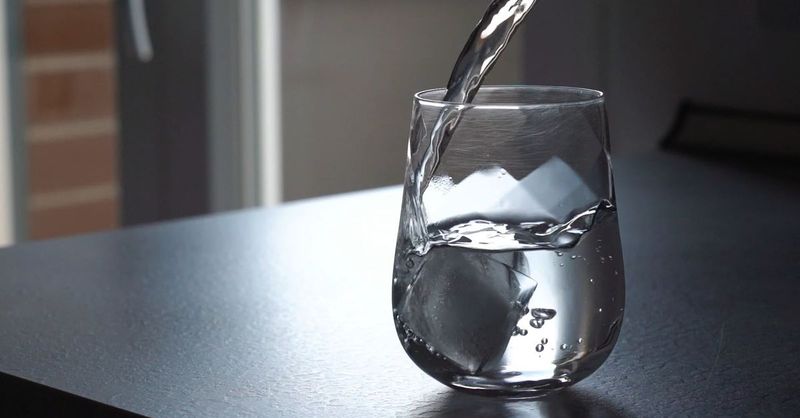 Ice Clinking Into a Cold Glass