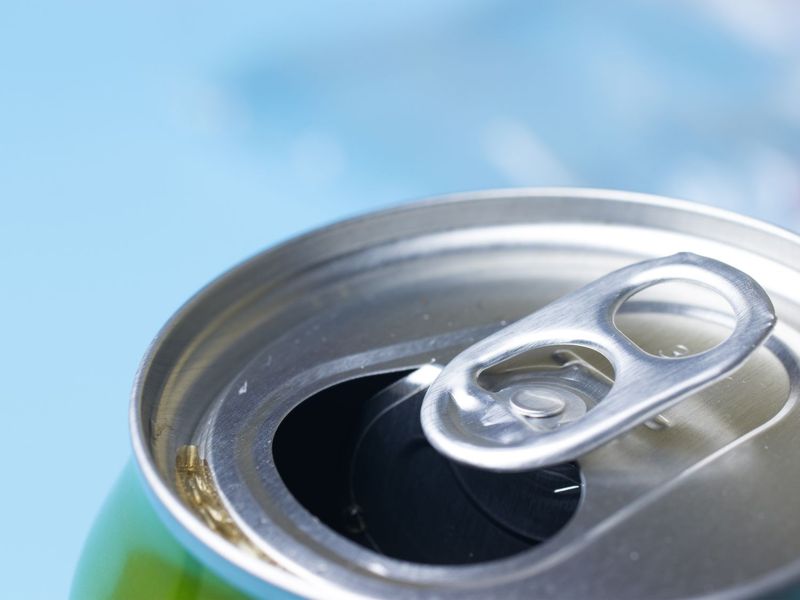 The Pop of a Soda Can Opening