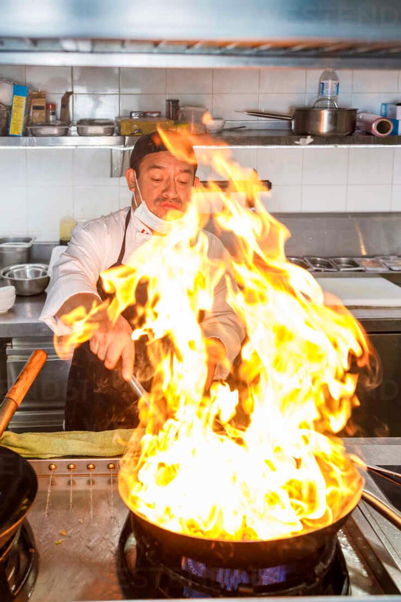 The Whoosh of a Flame Under a Wok