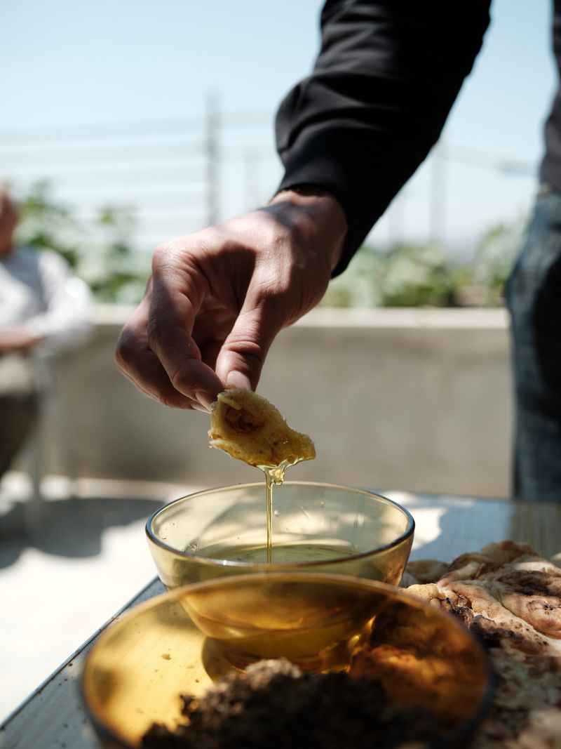 Dipping Bread Into Olive Oil Instead of Using Butter