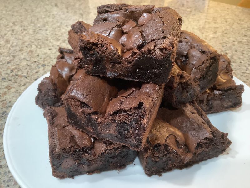 Scraping the Brownie Pan for the Chewy Edges