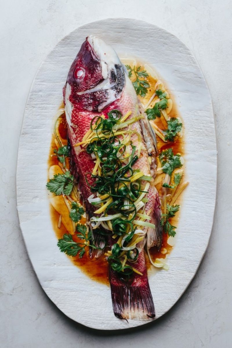 Steam Fish Over a Ginger and Scallion Bed