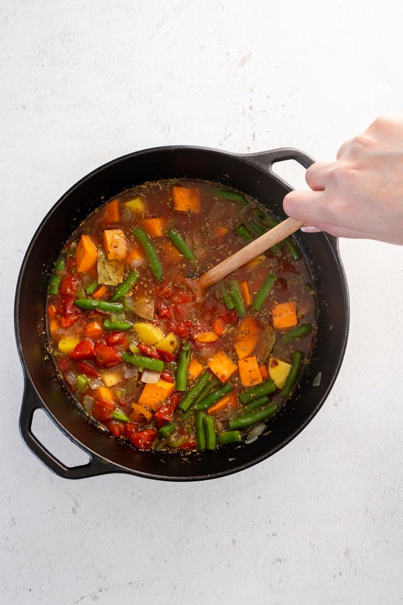 Stirring a Big Pot of Homemade Soup